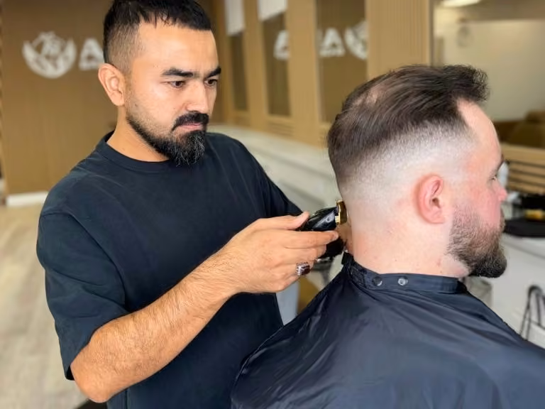 Beard trimming service at Aria Barbershop in Cambridge