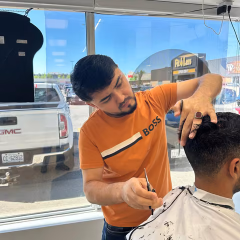 Ali, Master Barber at Aria Barbershop